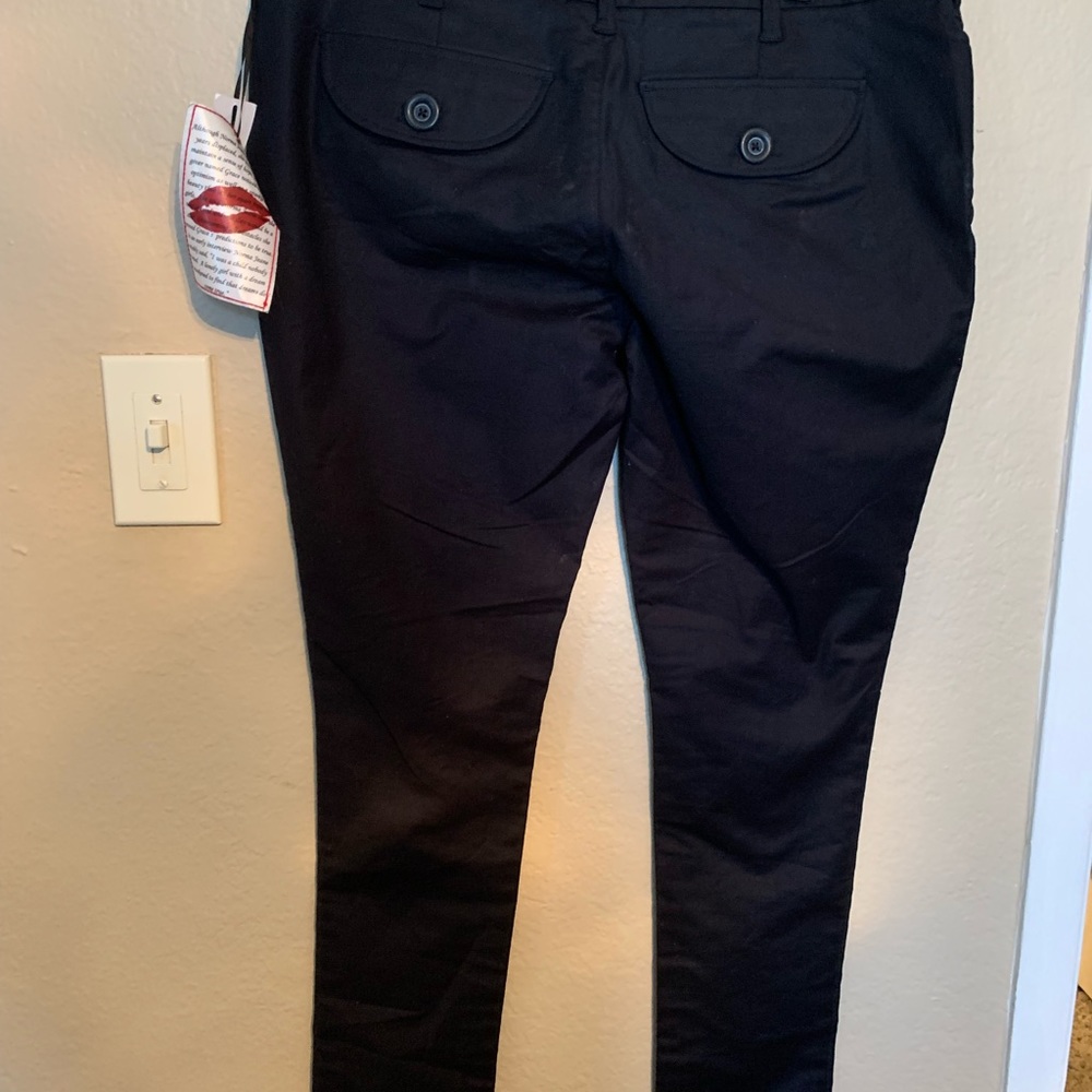 Norma Jeane boot cut black pants. NWT size 10